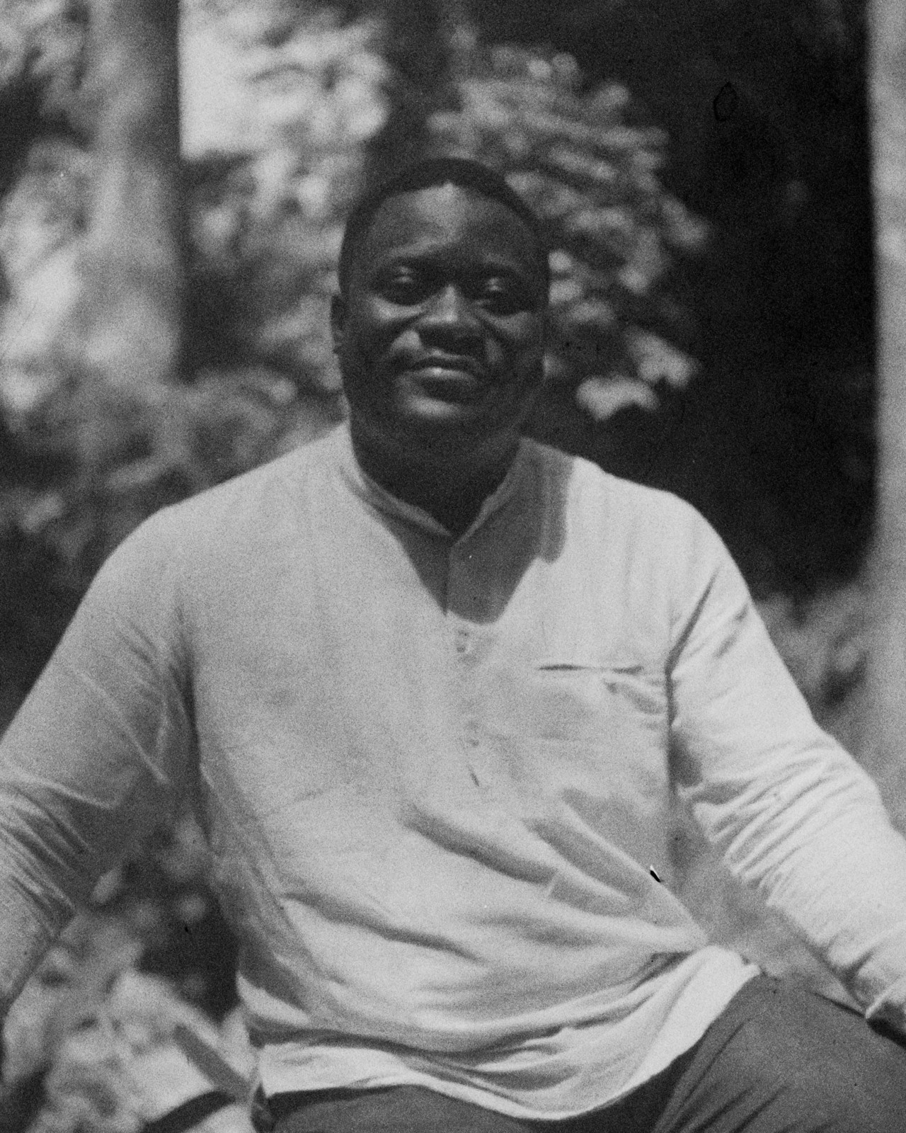 A portrait of Bayo Akomolafe
