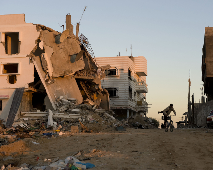 Residents of al-Zeitouin amid the damage after the Israeli bombing of the city in December and January 2009.