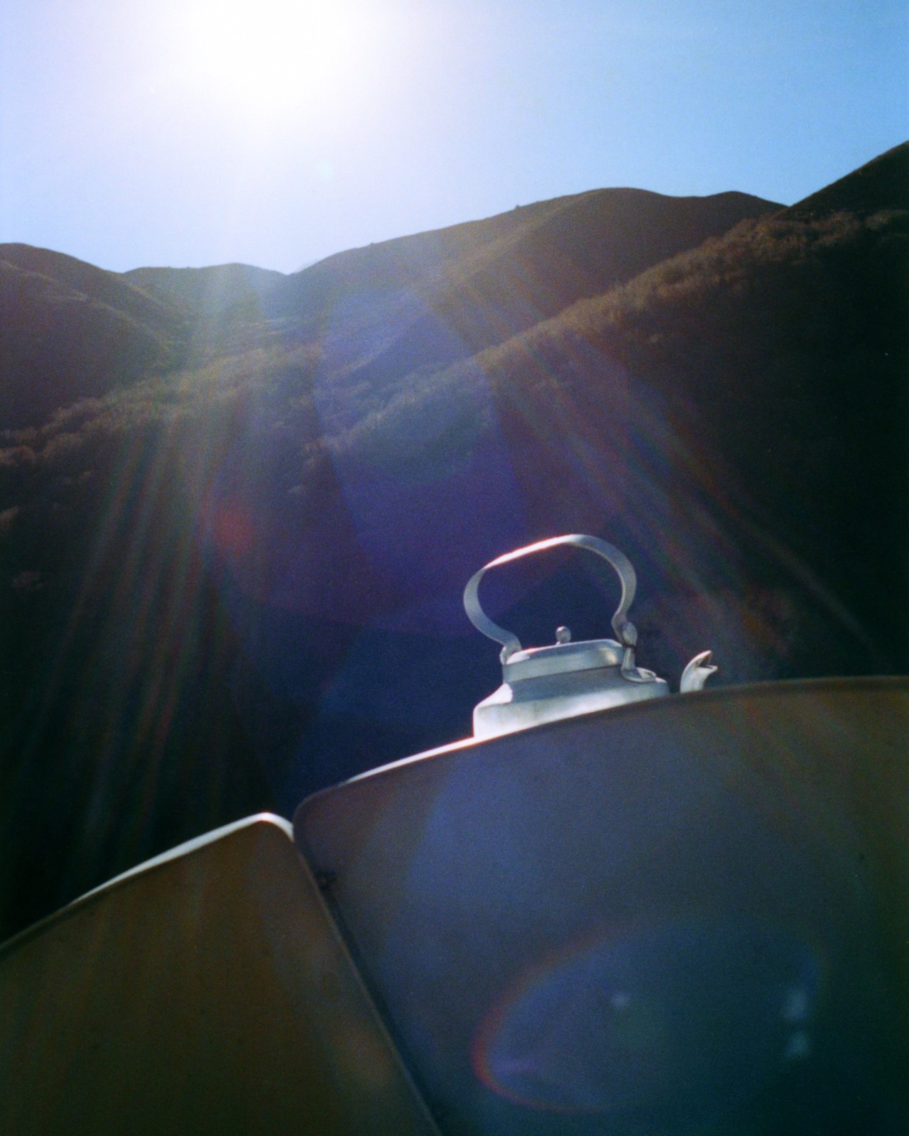 The sun shines down on the hills in the Himalayas.