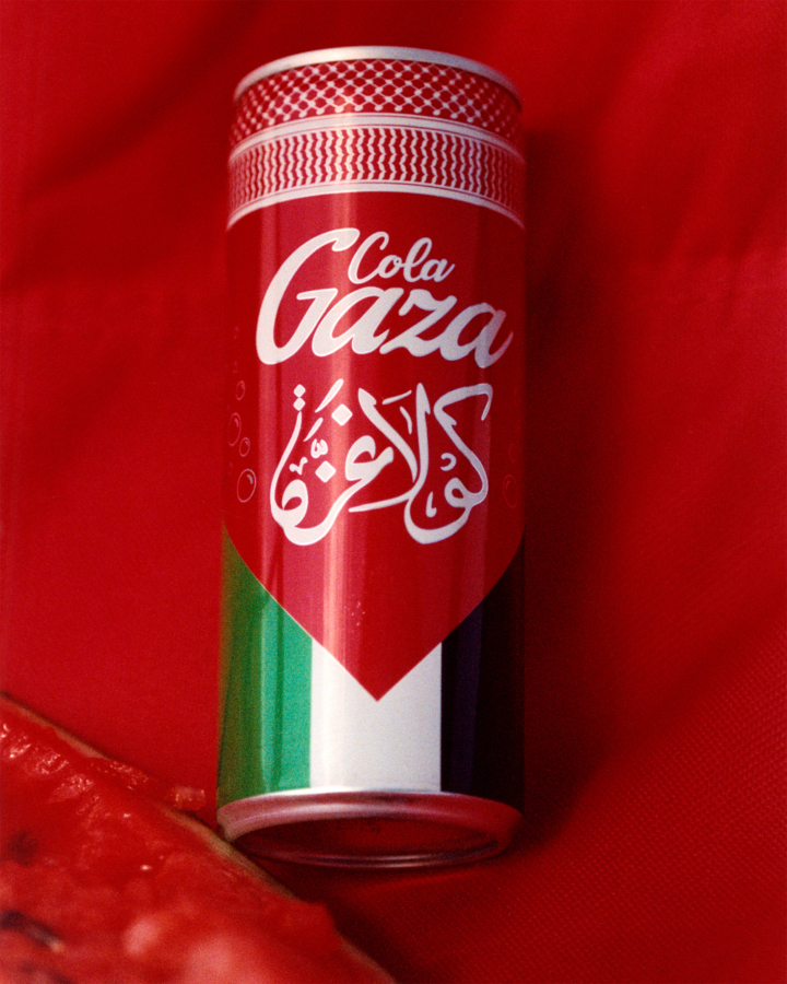 A can of Gaza cola lies on a piece of red cloth.