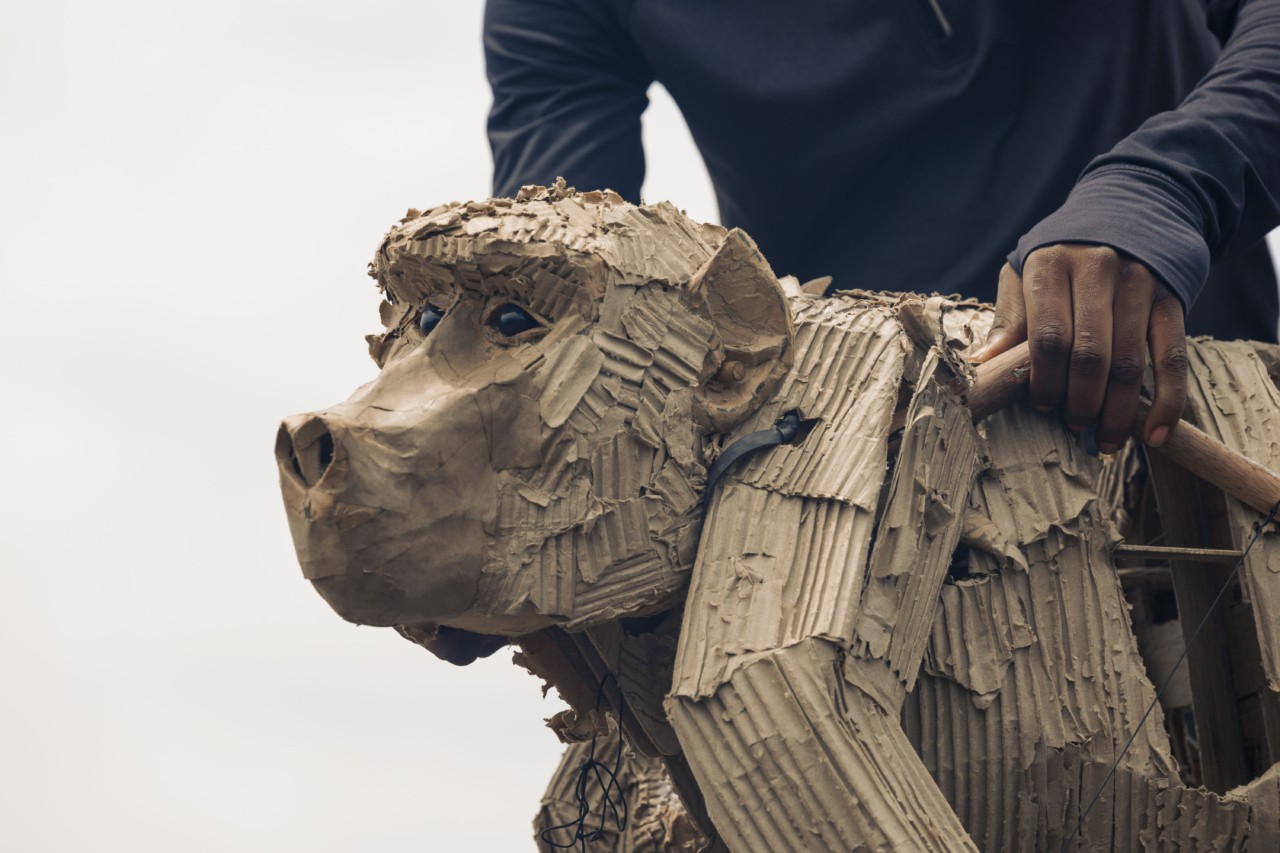 A monkey animal puppet.