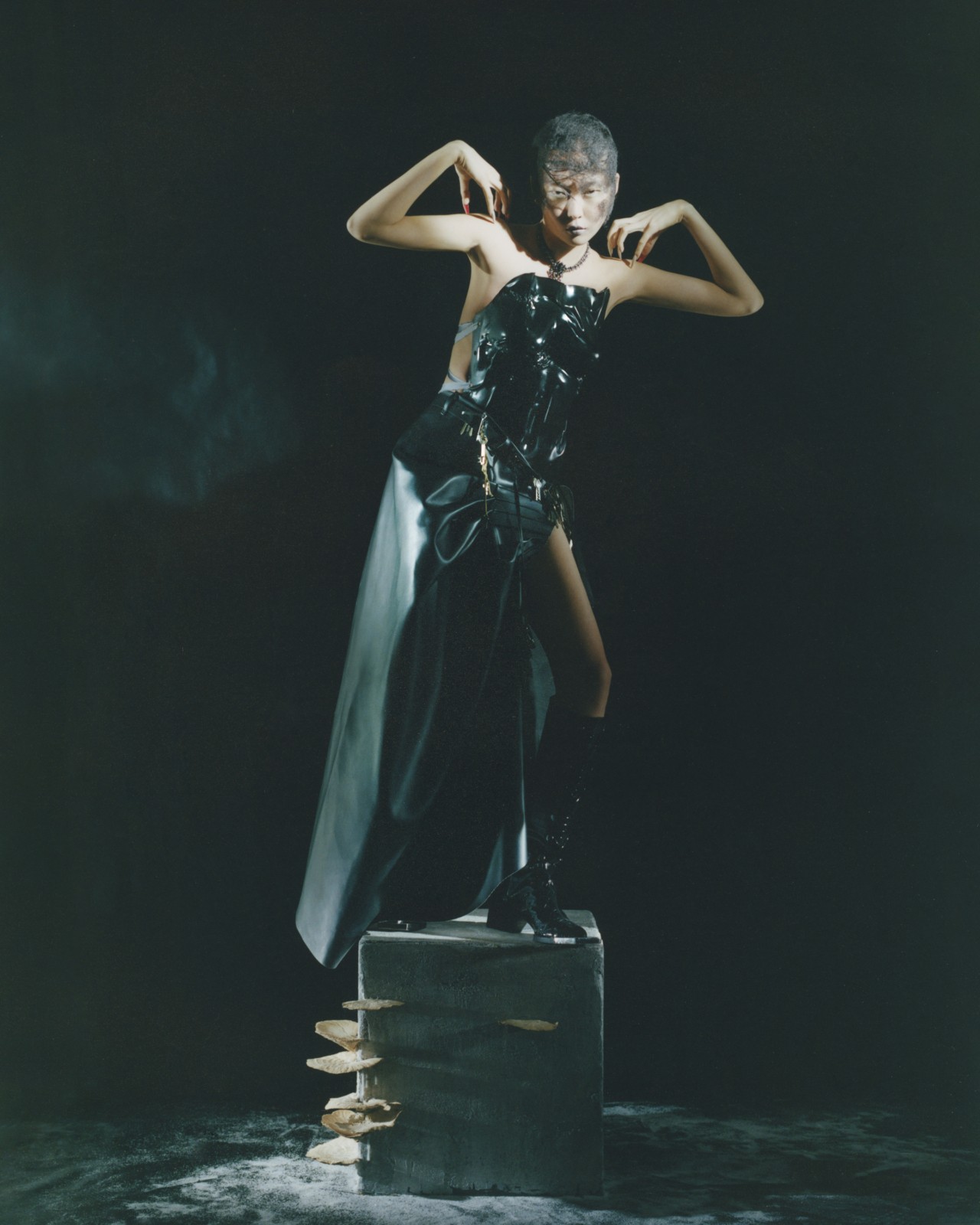 Model wears Xi Scorpii top and leather skirt, Jubilee Archive boots