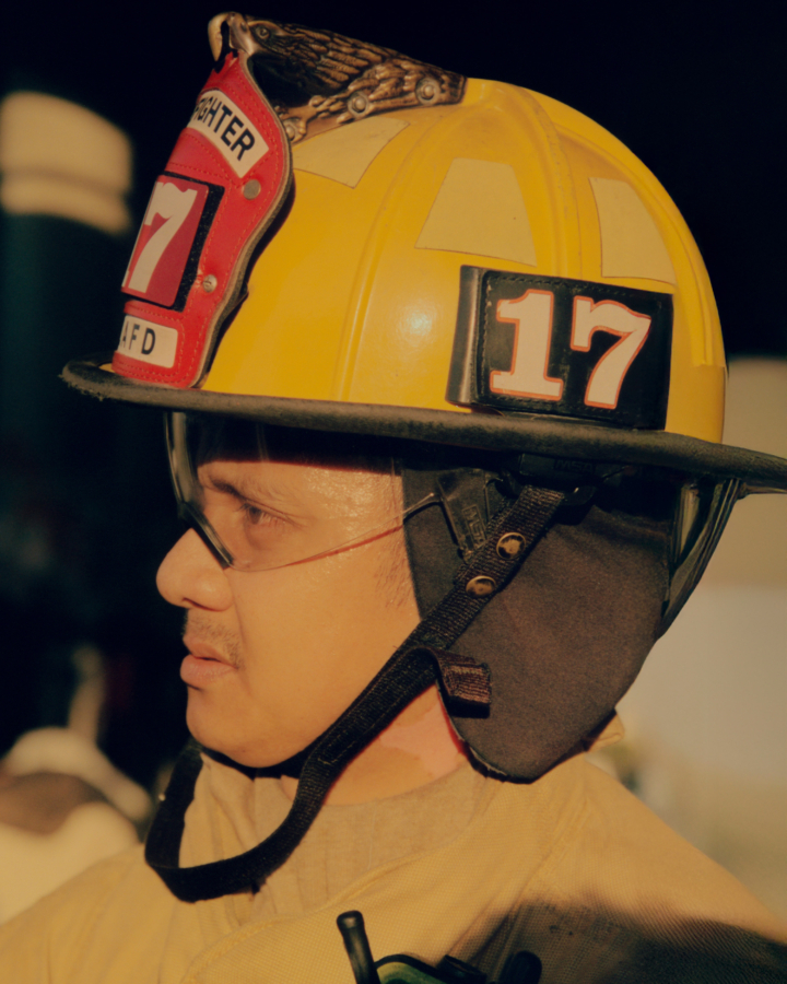 A headshot of a male firefighter.