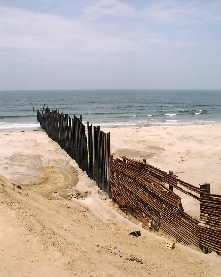 A metal gate separating Tijuana from San Diego.
