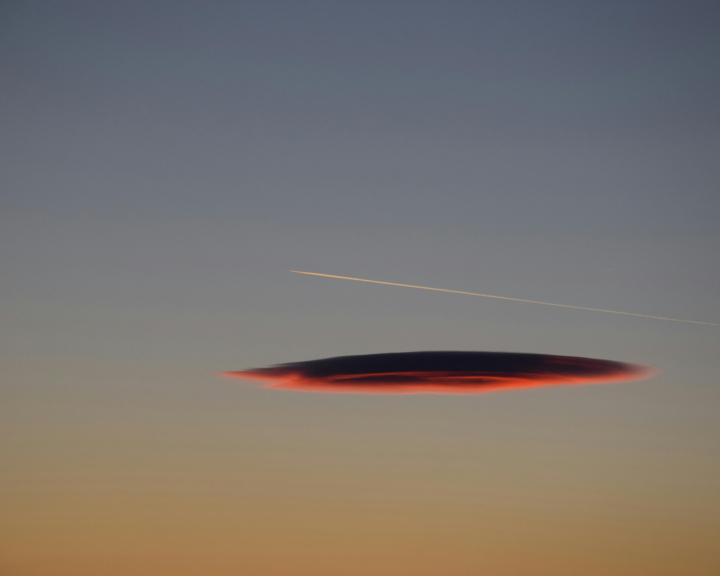 A contrail in the sky.