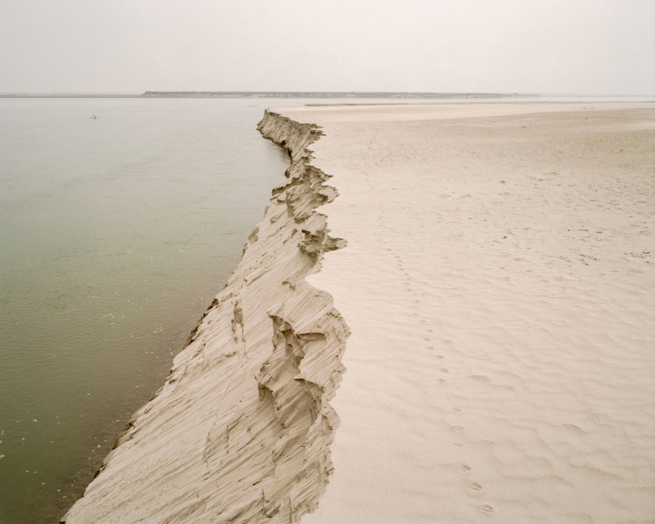 Where the land meets the Brahmaputra river.