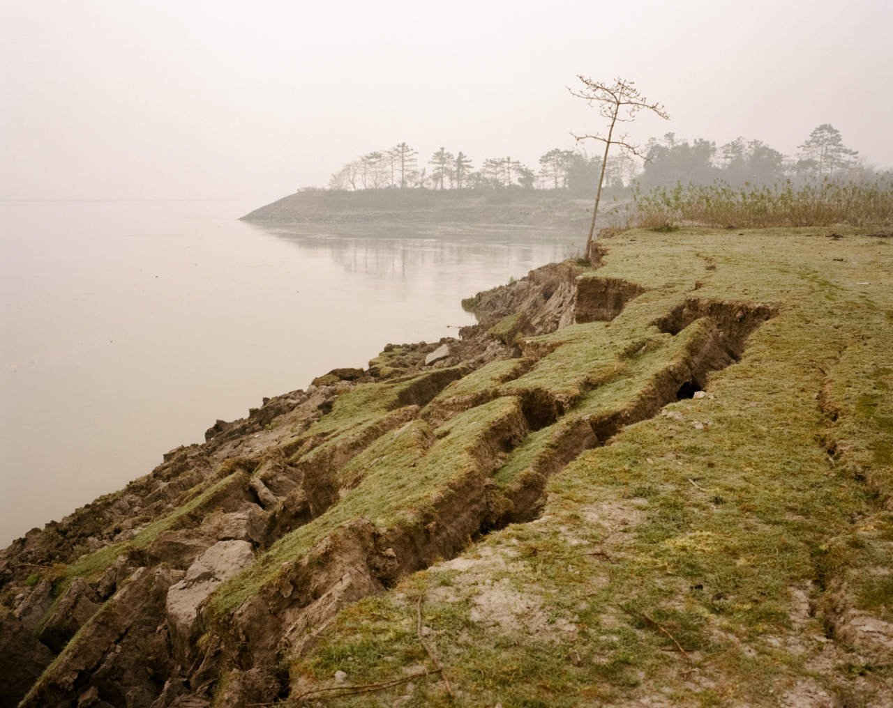 Where the land meets the Brahmaputra river.