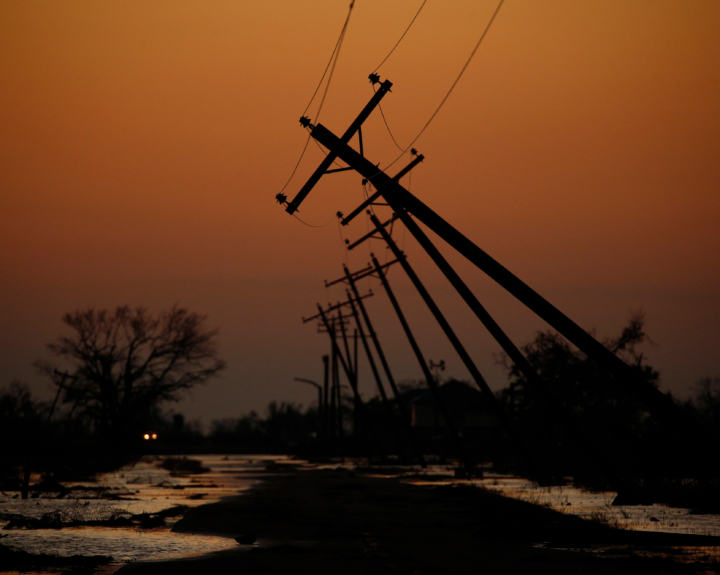 A powerline falls amid a storm.