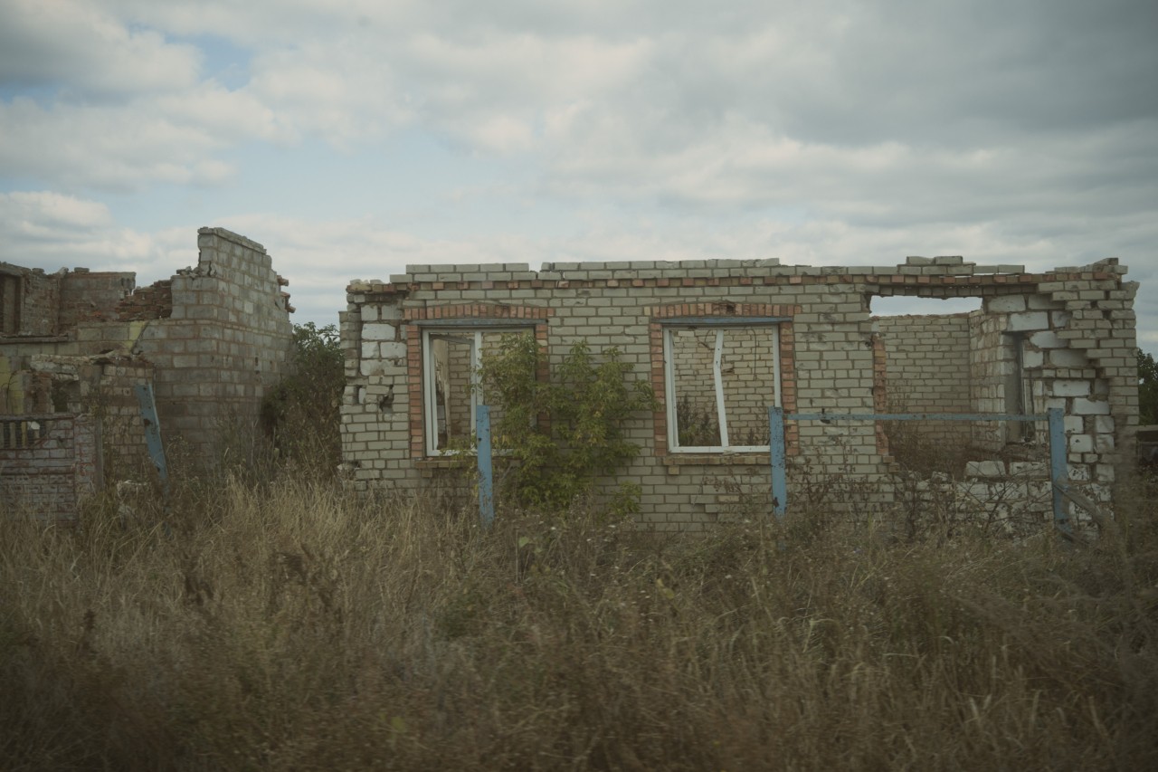 A damaged brick house.