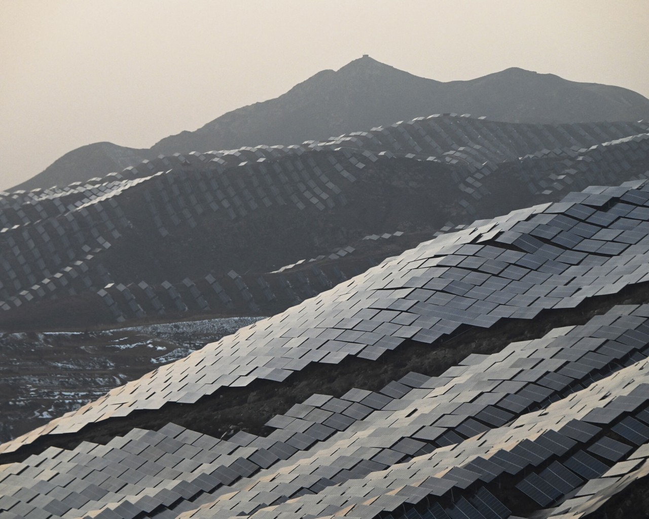 Solar panels cover China's mountains.