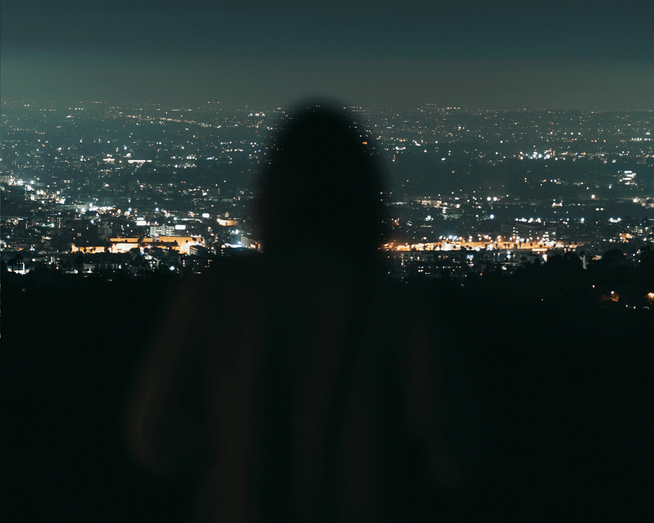 Gif of California governor, Gavin Newsom, and other images of mountains, ocean, and skylines to represent California.