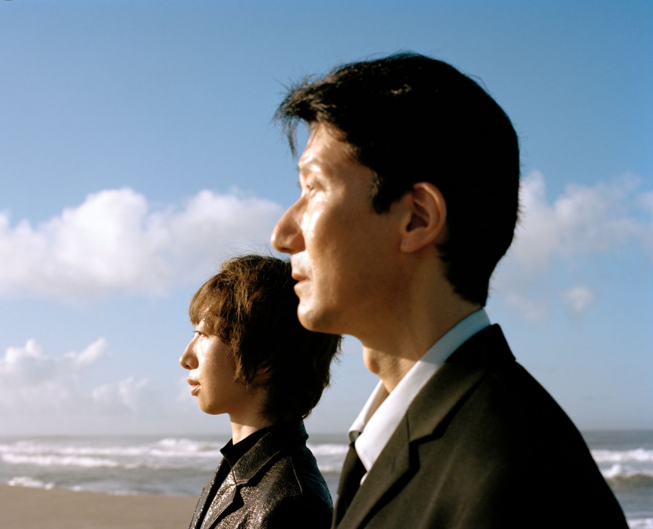 From left: Miyu wears Fetico jacket and tops. Koichi wears TH jacket, Ssstein shirt, Ami Paris tie