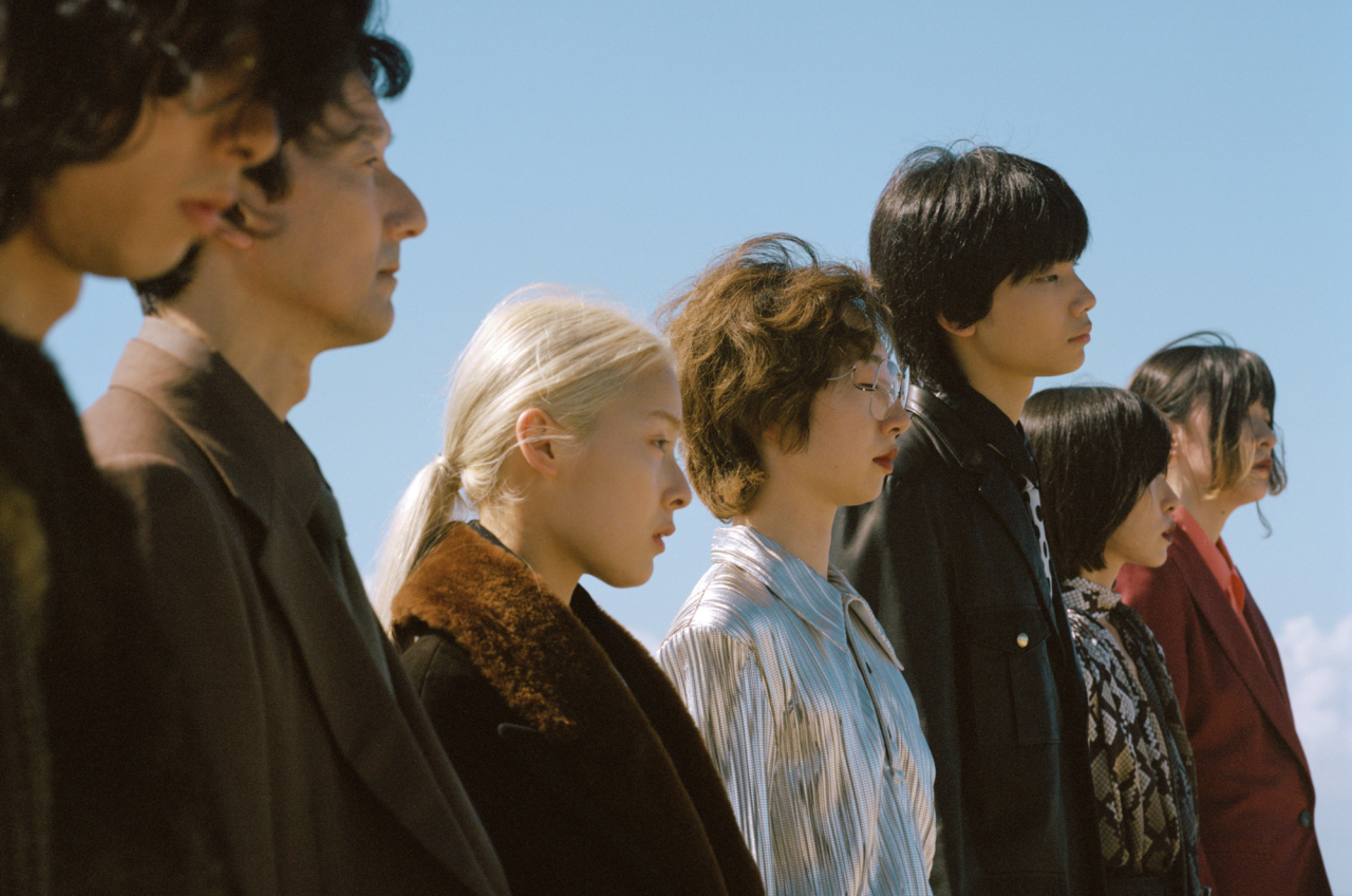 From left: Jinichiro wears Prada knit, vintage eyewear. Koichee wears Auralee jacket, shirt, and tie. Miu wears Prada jacket. Miyu wears Toga shirt, vintage eyewear. Souta wears Littlebig jacket, shirt, and tie. Meguro wears Stella McCartney tops, belt, and skirt. Yuumi wears Stella McCartney jacket, Irenisa shirt