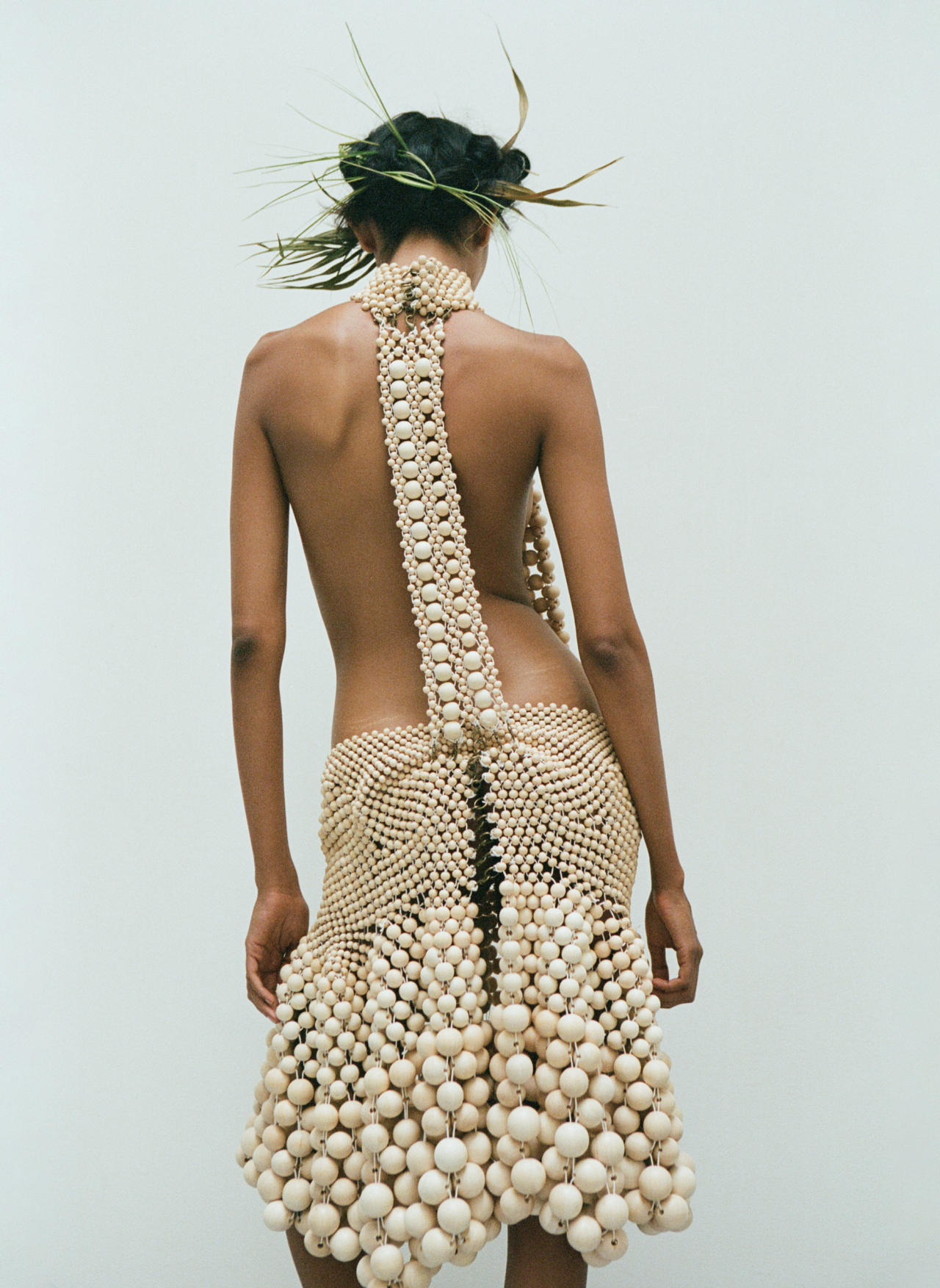 Padani wears Eugenia Alonso dress made from wood