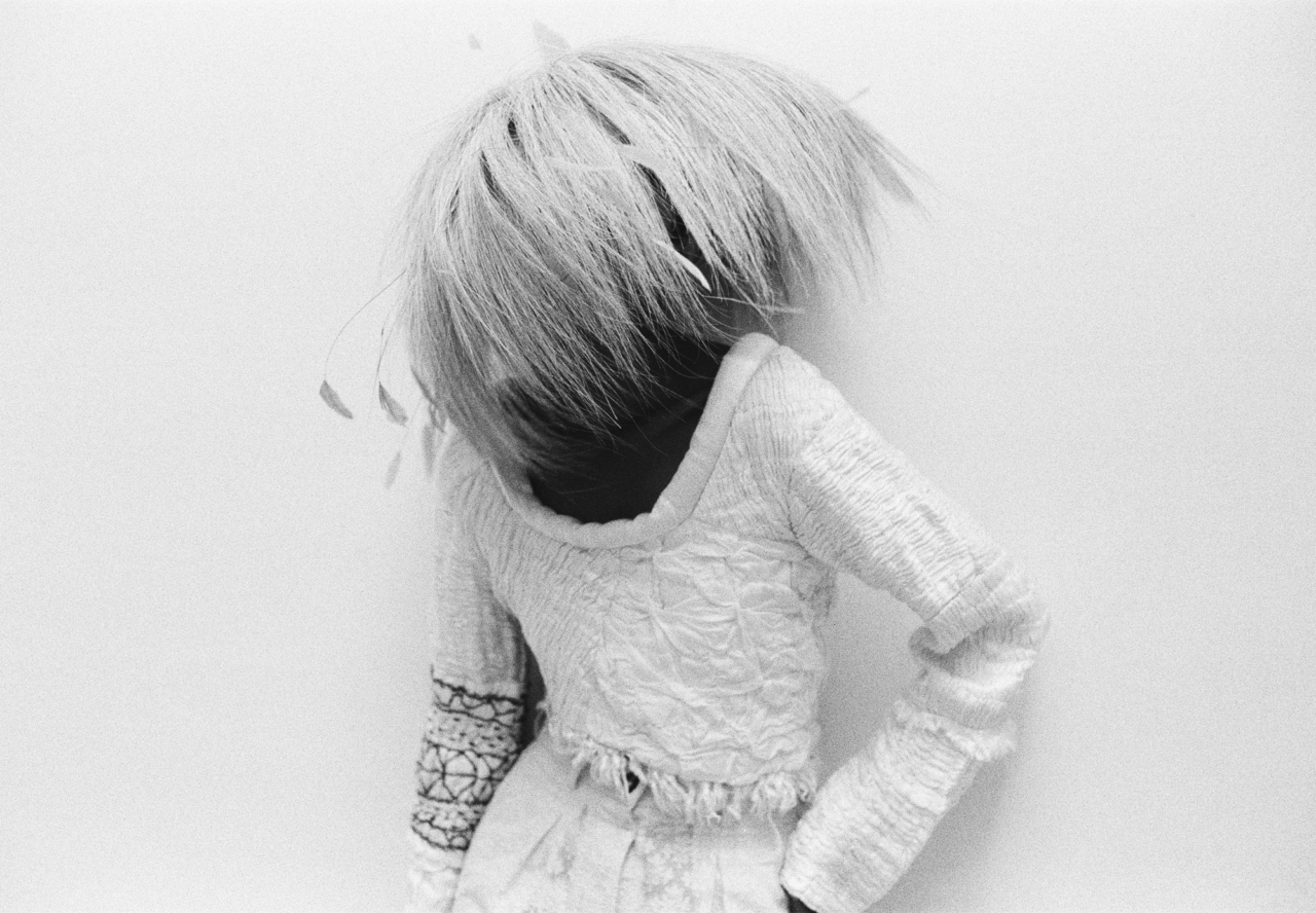 Padani wears Veronica Marucci hat made from hay and feathers, Tigra Tigra silk top, Kartik Research cotton pants