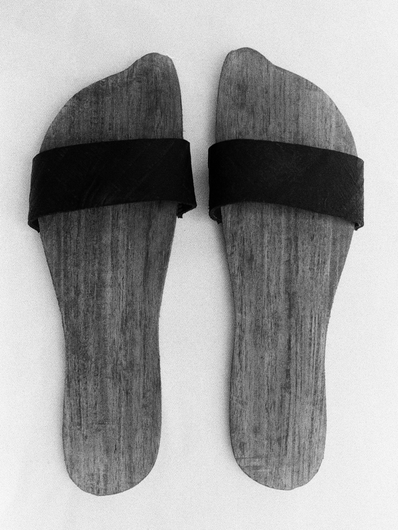 (right) Wood and natural rubber shoes