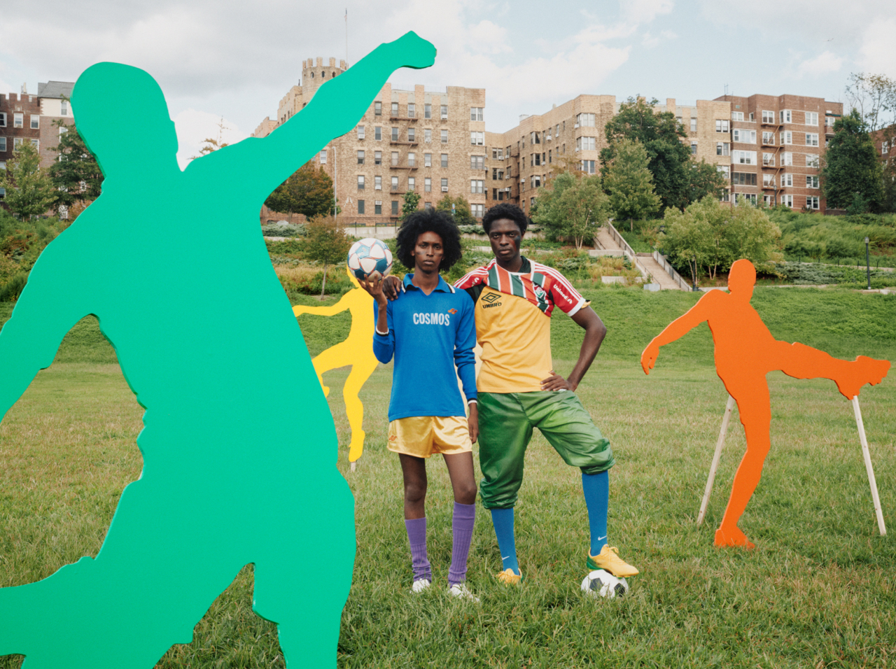 From left: Thursday wears Fabio Quaranta Urania: Soccer Edition shirt, shorts, and socks, Sokito boots. Samuel wears vintage bootleg soccer shirt, vintage Umbro shirt and pants, Nike soccer socks, Sokito boots
