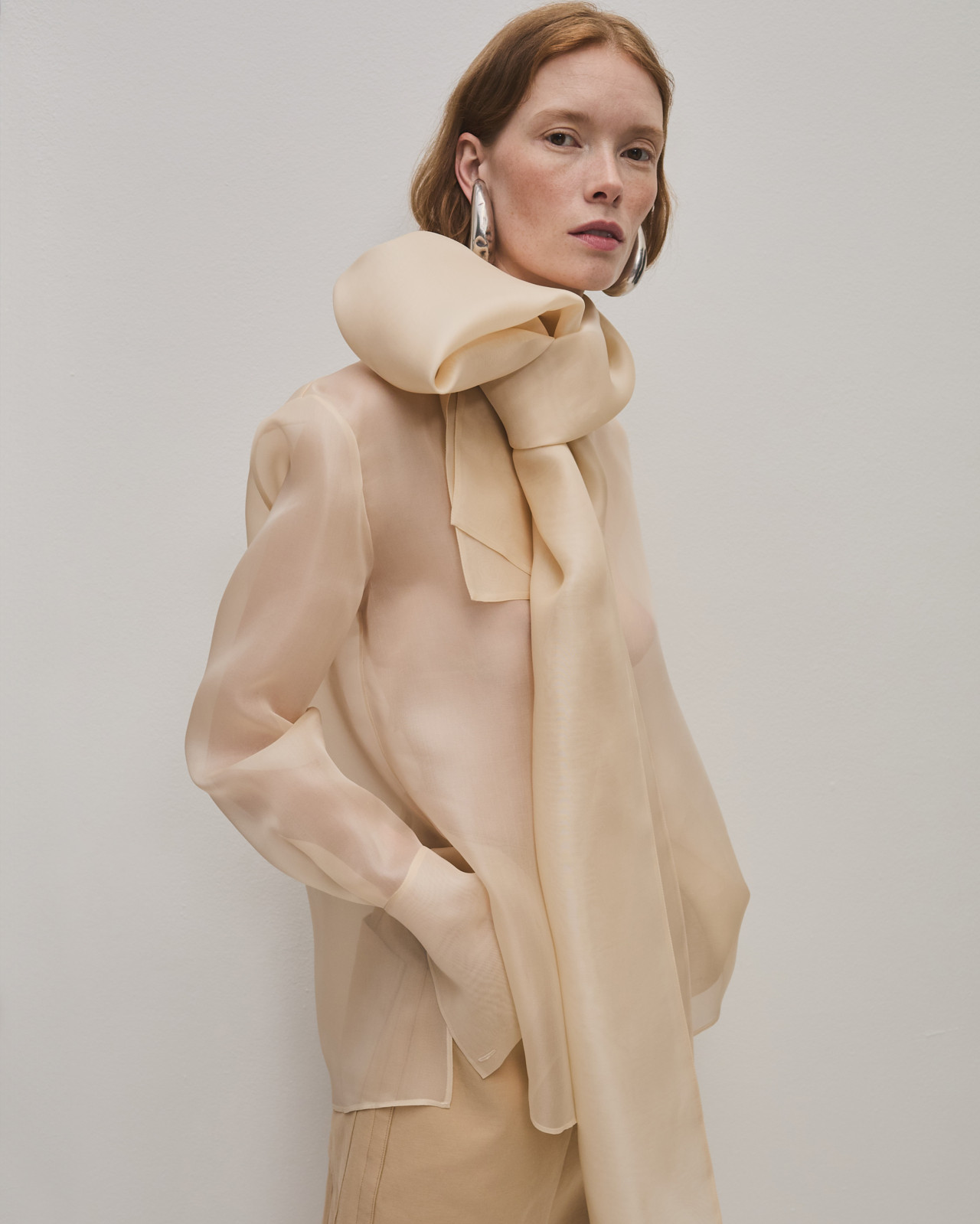 A model wears Another Tomorrow clothing.