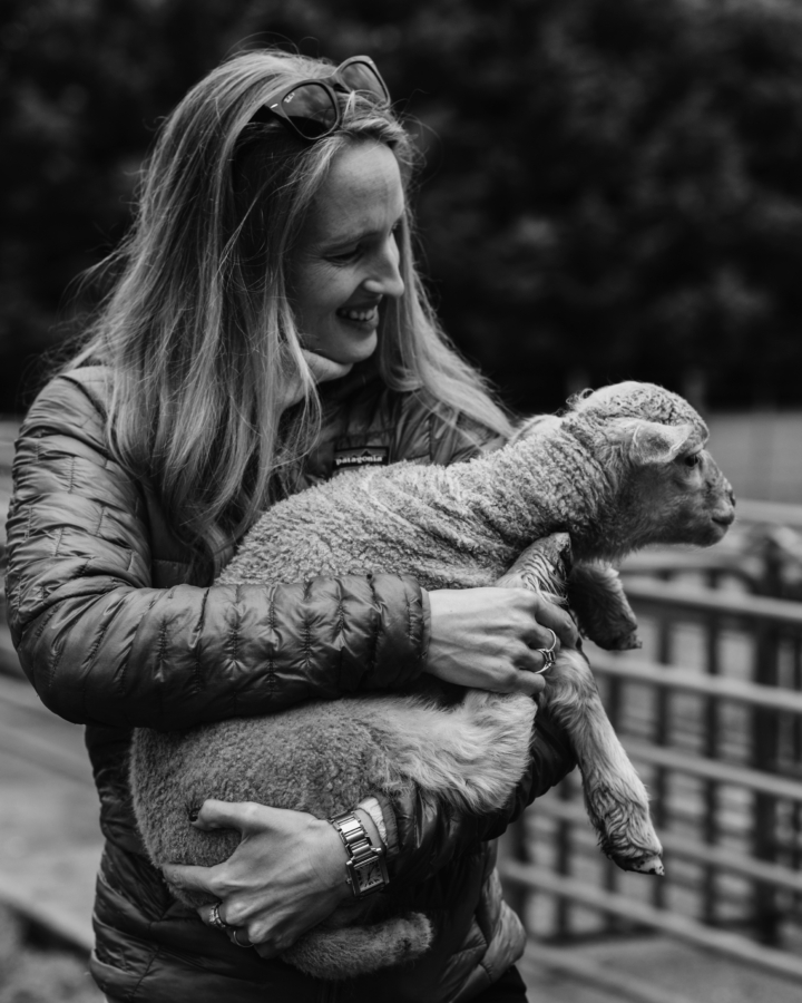 Vanessa Barboni holds a lamb.