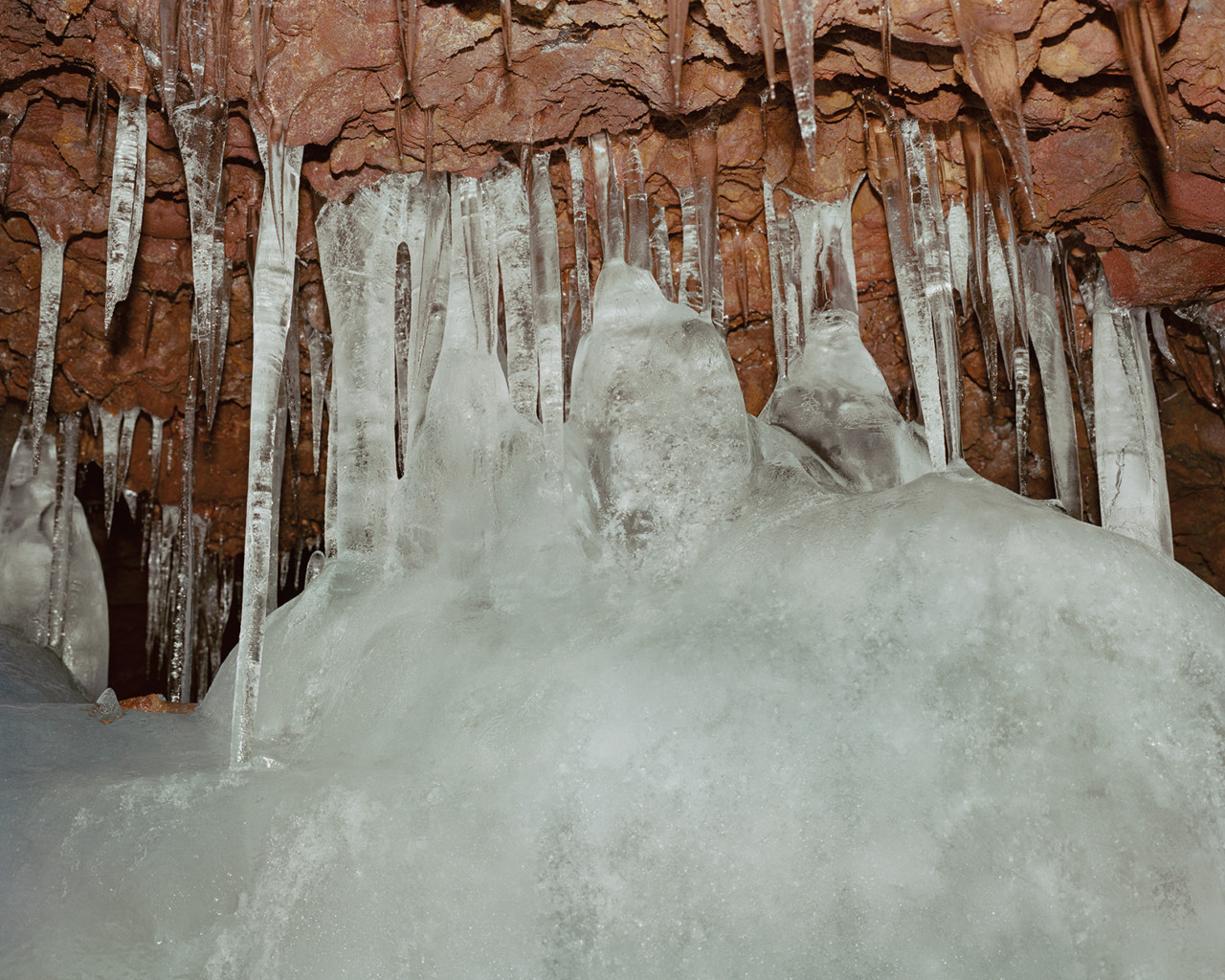 Icicles form inside of a cave.