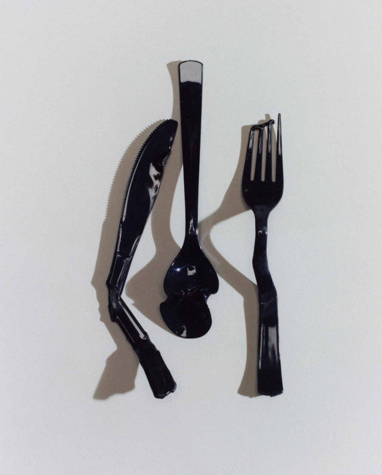 Bent up plastic cutlery.