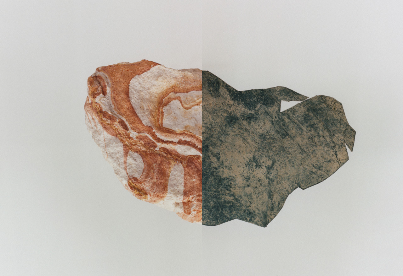 A half pink rock, half brown rock.