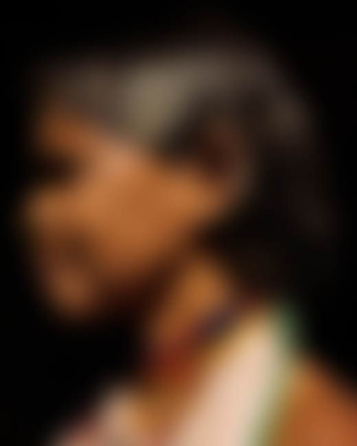 A side profile portrait of a woman in Odisha, India.